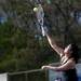 Huron No 1 doubles player Val Peng spikes in a match against Pioneer on Tuesday, May 7. Daniel Brenner I AnnArbor.com
